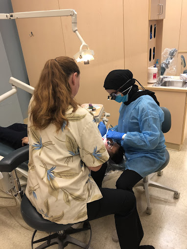 Amy and Hussien Dentists in Auburn Hills Working on Dental Implant Placement